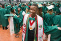 Primary view of [Decorated Student At His Commencement Ceremony]