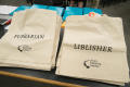 Photograph: [Canvas Tote Bags that read "Pubrarian" and "Liblisher"]