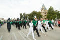 Photograph: [Green Brigade Marching Band in Homecoming Parade]