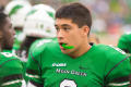 Photograph: [Mason Fine on sidelines during UNT Homecoming game]
