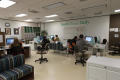 Photograph: [Staffers working during late night]