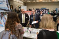 Photograph: [Students speaking with Fort Worth Business Press representatives]