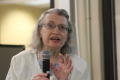 Photograph: [CSLA Treasurer Evelyn Pockrass giving report at conference meeting]
