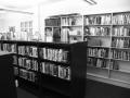 Photograph: [Book shelves in library]