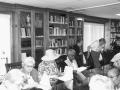 Photograph: [Conference guests seated in library at Or Shalom Synagogue]