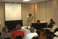 Primary view of [Linda Corey giving presentation at CSLA conference]