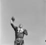 Photograph: [Football player throwing a football, 7]