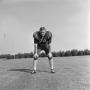 Photograph: [Football player leaning on his knees, 3]