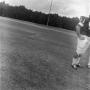 Photograph: [Football player standing on the field]