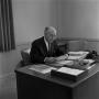 Photograph: [Photograph of Dr. Gafford at his desk #5]