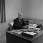 Photograph: [Photograph of Dr. Gafford at his desk #6]