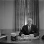 Photograph: [Photograph of Dr. Gafford at his desk #2]