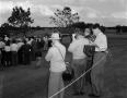 Photograph: [Reporters at a golf tournament]