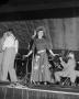 Photograph: [Singer on Stage with Musicians]