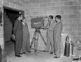 Photograph: [Four men with a WBAP-TV camera]