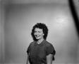 Photograph: [Portrait of a woman with curly hair]