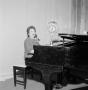 Photograph: [Woman at the piano]