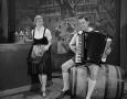 Photograph: [Bob Bohme and unidentified woman in Oktoberfest clothing]