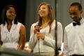 Photograph: [student singer Gabby Hill with fellow students]