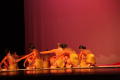 Photograph: [Photograph of a group of dancers sitting on stage]