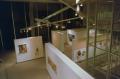 Photograph: [Aerial view of sculptures and paintings on display in gallery]