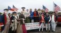 Photograph: [TXSSAR Arlington chapter members in colonial clothing during parade]