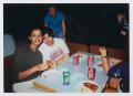 Photograph: [Photograph of TAMS students eating pizza]