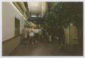 Photograph: [Photograph of TAMS group in hallway]