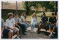 Photograph: [Photograph of TAMS students sitting on benches]