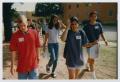 Photograph: [Photograph of a few TAMS students walking]