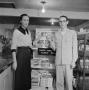 Photograph: [Cook Book Cake display at a Silsbee food store]
