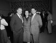 Photograph: [W. H. Aukman, Margaret McDonald, and Robert Gould at a party]