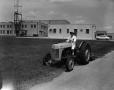 Photograph: [Freda driving a tractor]