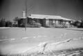 Photograph: [Photograph of a house covered in snow]