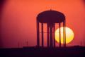 Photograph: [Sunset and water tower]