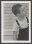 Photograph: [Photograph of Tim Williams in overalls, 8]
