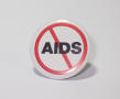 Photograph: ["No AIDS" button]
