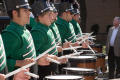 Photograph: [Mean Green Brigade playing drums in UNT Homecoming Parade, 2007]
