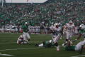 Photograph: [FAU player dodging UNT players, September 22, 2007]