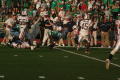 Photograph: [FAU player tackling UNT player, September 22, 2007]