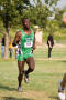 Photograph: [Frank Ngeno running on Denton course]