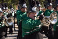 Photograph: [Mean Green Brigade baritone players in UNT Homecoming Parade, 2007]