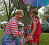 Photograph: [Clown and young girl at Denton Arts & Jazz Festival]