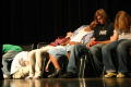 Photograph: [Hypnotized students on stage]