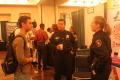 Photograph: [Student speaking with Arlington Police at 2007 UNT Business Fair]
