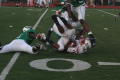 Primary view of [Cortez Gent rolling after being tackled, September 22, 2007]
