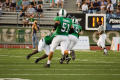 Photograph: [Attempted tackle during UNT vs. Navy game, 2007]
