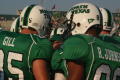 Photograph: [Victor Gill and Roderick Johnson in huddle, September 22, 2007]