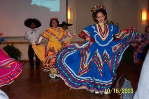 Primary view of object titled '[Folklorico dancers performing in ballroom]'.