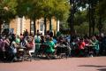Primary view of [Students seated down and enjoying a free lunch]
